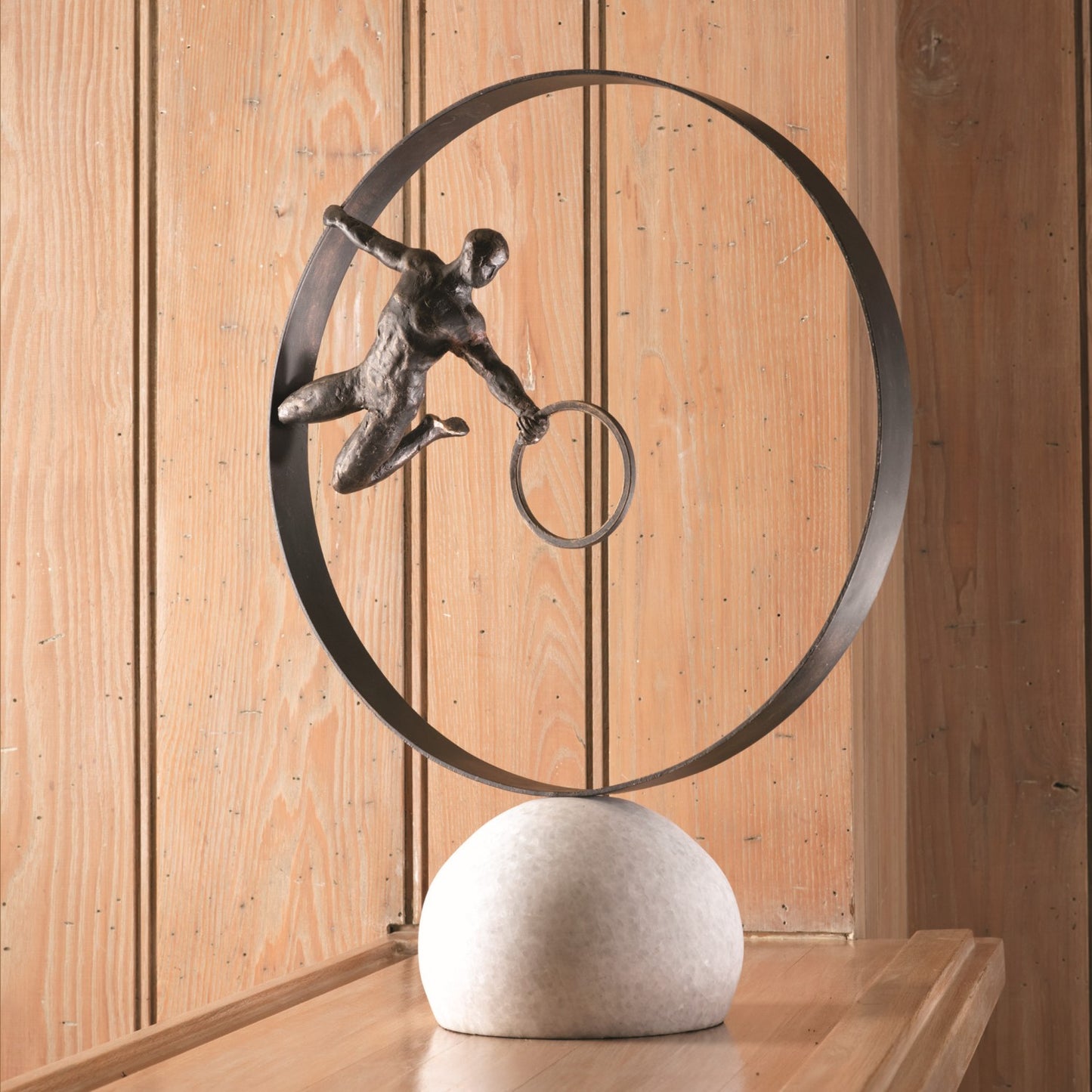 MAN IN CIRCLE SCULPTURE-BRONZE