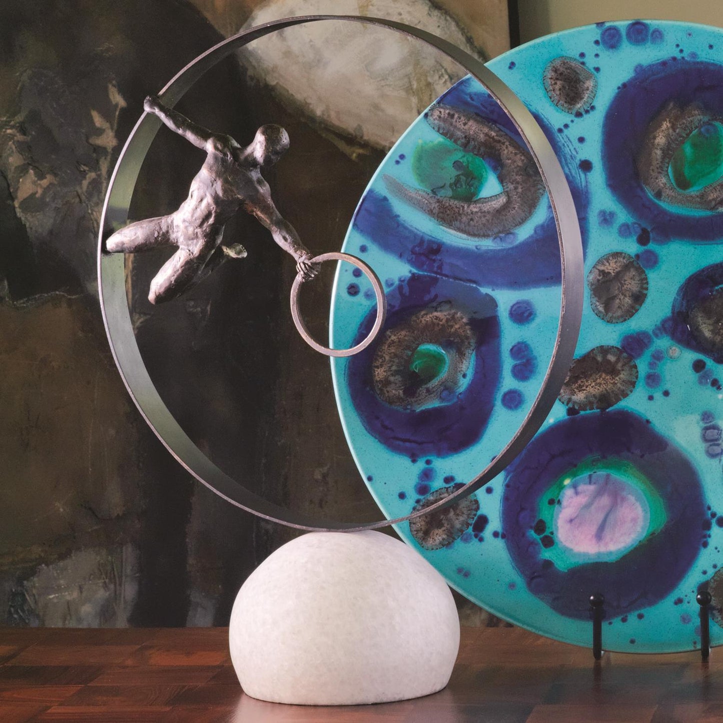 MAN IN CIRCLE SCULPTURE-BRONZE