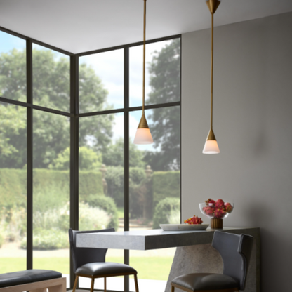 Rai Pendant - Elegant Illuminator with Alabaster Cone Shade and Antique Brass Finish